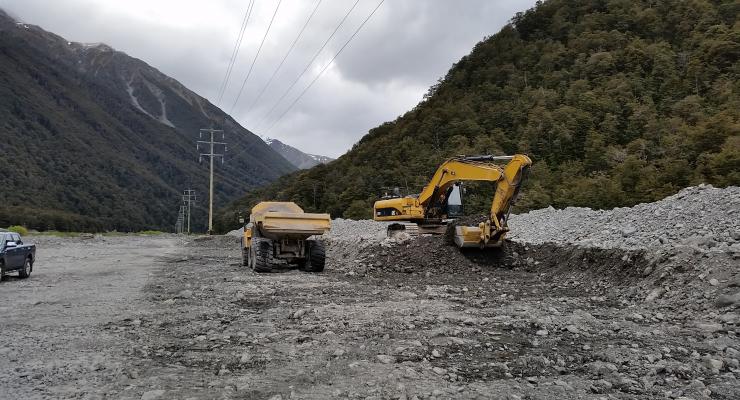 Diggers in river for environmental management plans